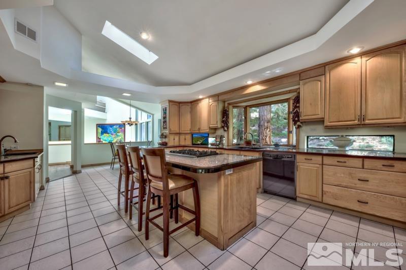 369 Summit Drive Stateline, NV 89449 - Photo 8 of 39 a kitchen with a sink and cabinets
