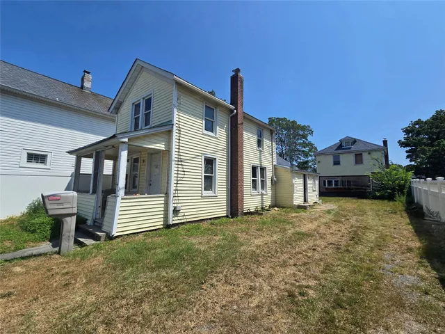 a front view of a house with garage