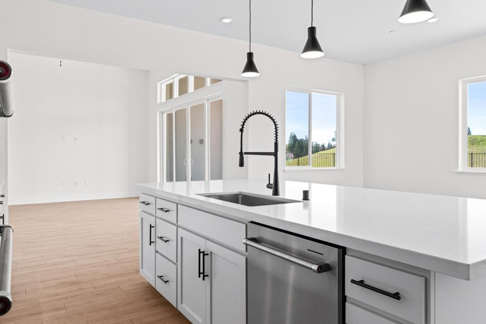 7058 Sheldon Rnch Drive Rancho Murieta, CA 95683 - Photo 12 of 26 a kitchen with cabinets a sink and a window