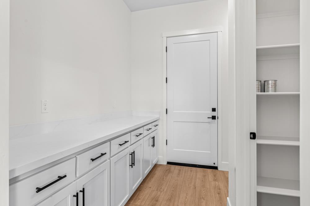 7058 Sheldon Rnch Drive Rancho Murieta, CA 95683 - Photo 13 of 26 a view of an empty walk in closet