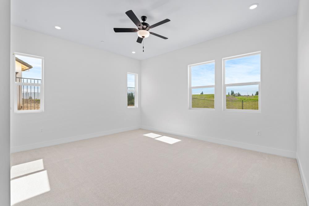 7058 Sheldon Rnch Drive Rancho Murieta, CA 95683 - Photo 20 of 26 wooden floor in an empty room with a window