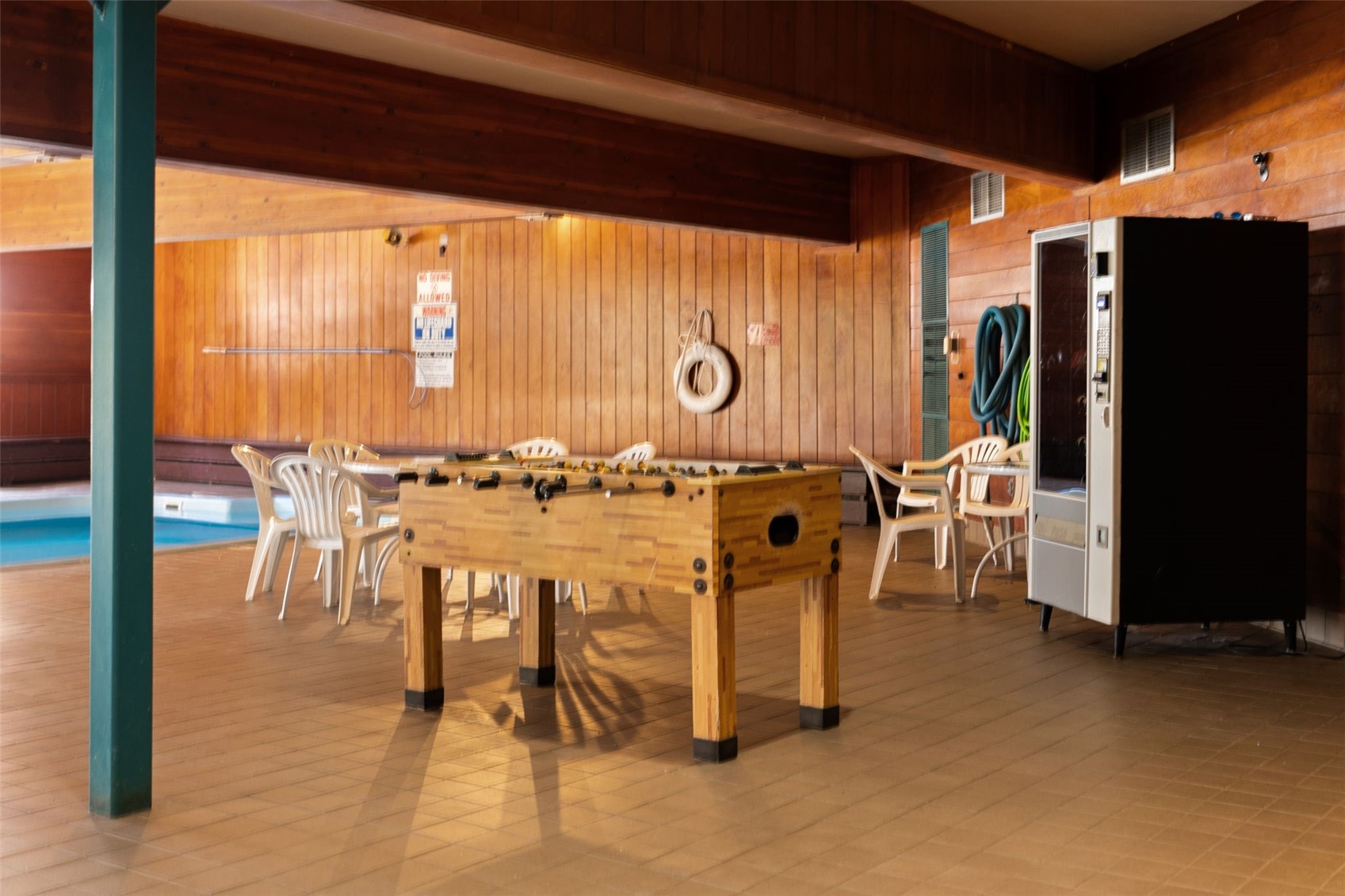 91300 Ryan Gulch Road, Unit 91311 Silverthorne, CO 80498 - Photo 25 of 29 a dinning table and chairs in a room