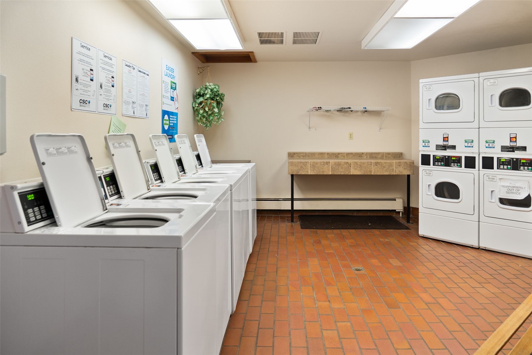 91300 Ryan Gulch Road, Unit 91311 Silverthorne, CO 80498 - Photo 28 of 29 a utility room with dryer and washer