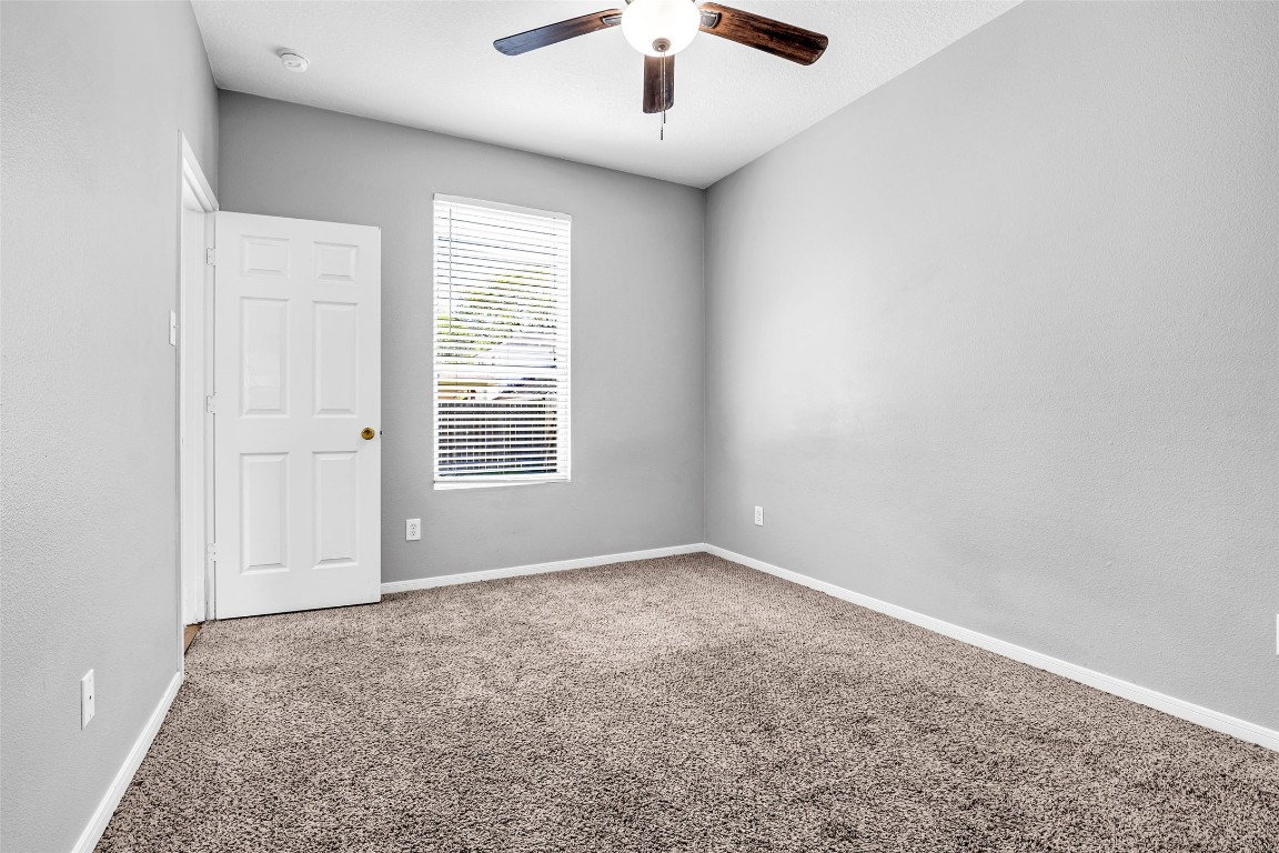 5026 Forest Hurst Drive Spring, TX 77373 - Photo 18 of 31 an empty room with a window