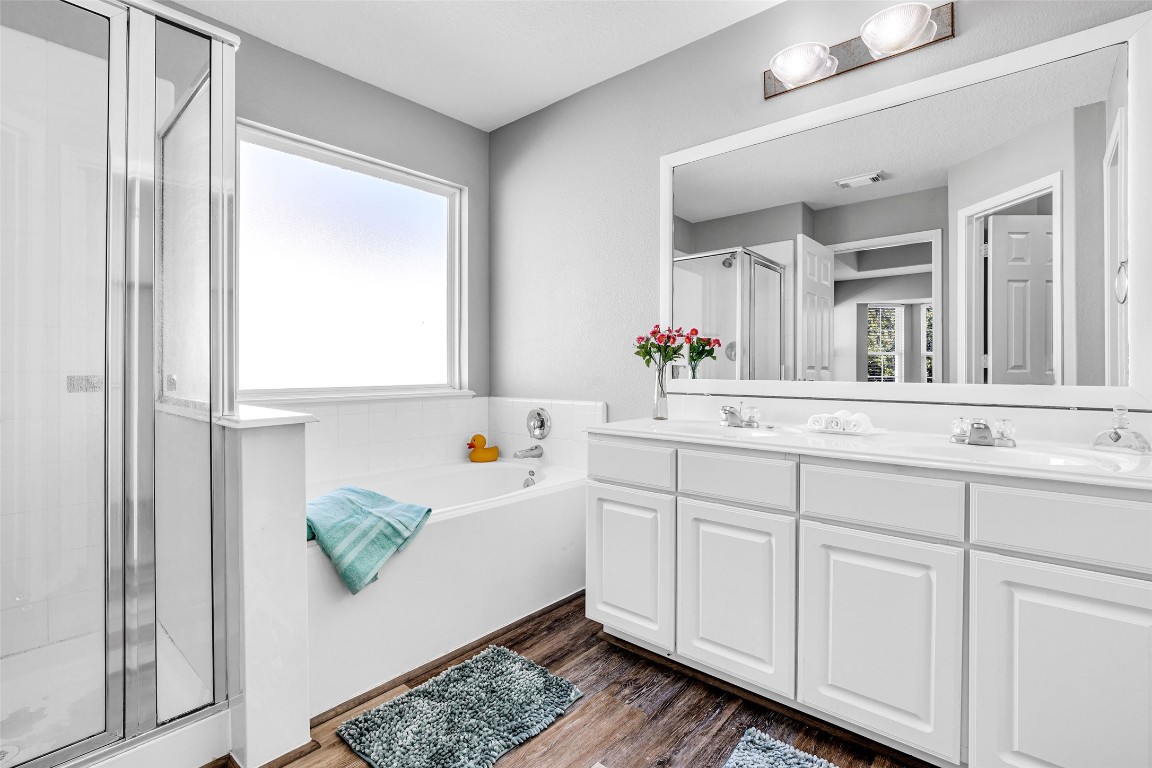 5026 Forest Hurst Drive Spring, TX 77373 - Photo 24 of 31 a bathroom with a sink and a mirror