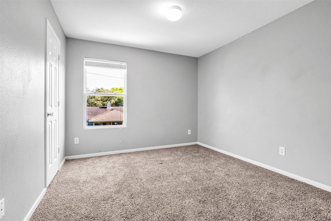 5026 Forest Hurst Drive Spring, TX 77373 - Photo 27 of 31 an empty room with windows