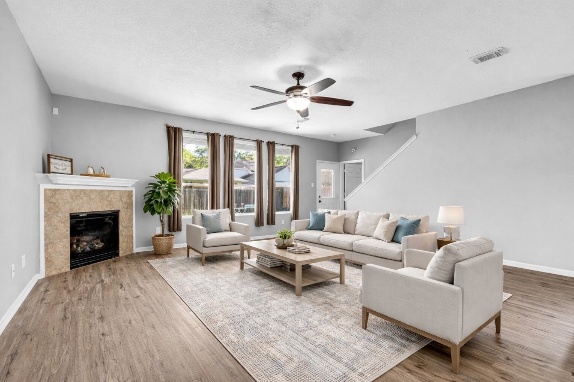 5026 Forest Hurst Drive Spring, TX 77373 - Photo 5 of 31 a living room with furniture and a fireplace