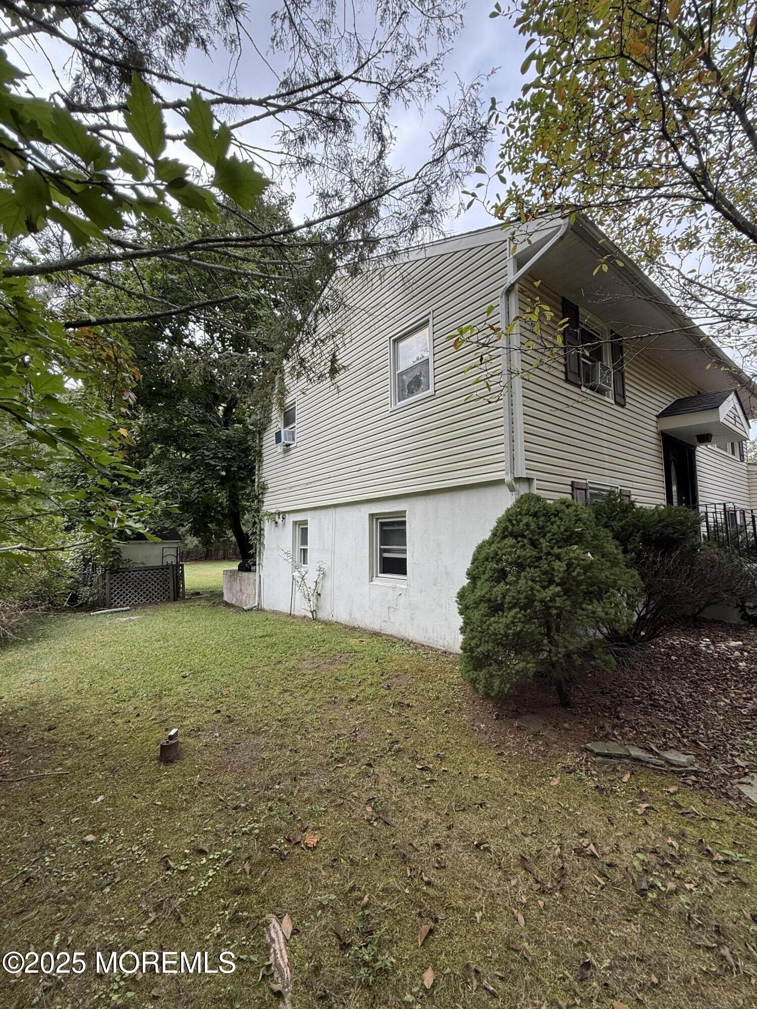 7 Charles Street Howell, NJ 07731 - Photo 2 of 8 a view of a house with a yard