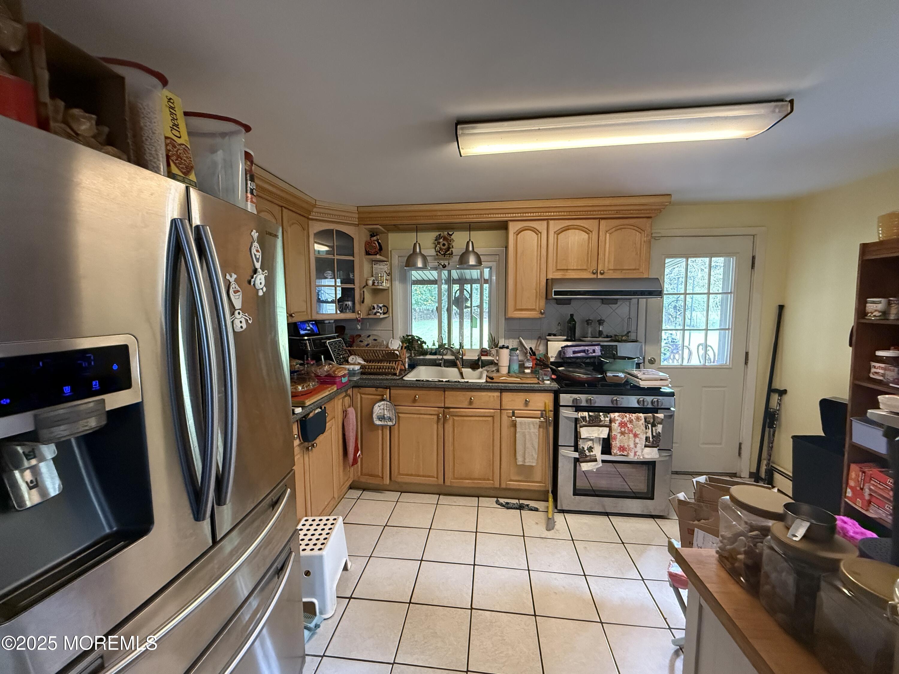 7 Charles Street Howell, NJ 07731 - Photo 4 of 8 a kitchen with stainless steel appliances a refrigerator sink and microwave