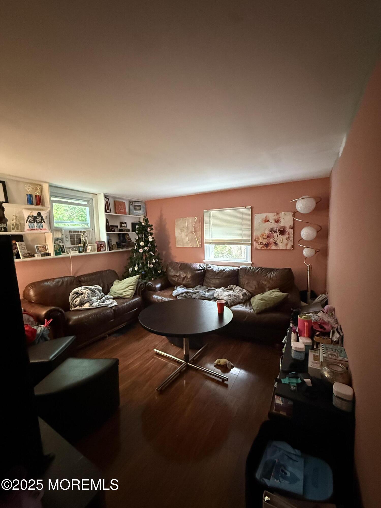 7 Charles Street Howell, NJ 07731 - Photo 6 of 8 a living room with furniture and a flat screen tv