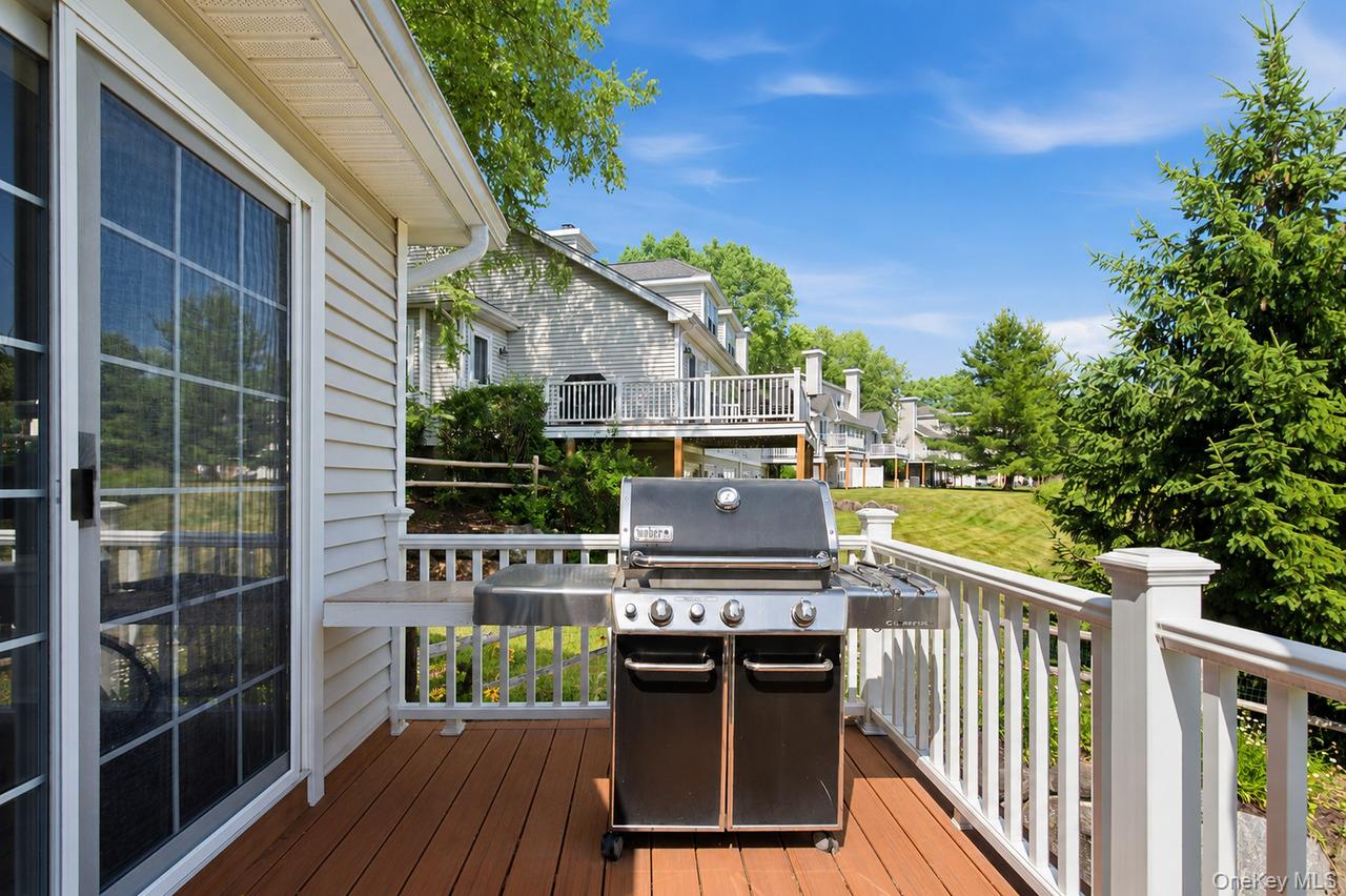64 Roma Orchard Road Peekskill, NY 10566 - Photo 35 of 40 Outdoor deck featuring wood-finish flooring and white railings