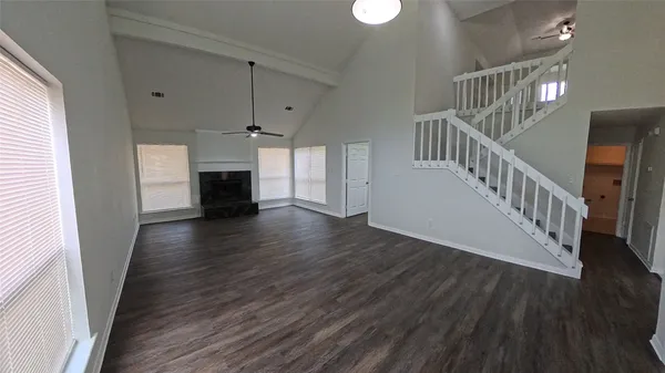 a view of entryway with wooden floor