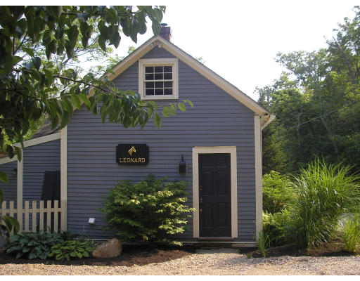 278 Allen Road Ashby, MA 01431 - Photo 3 of 9 a front view of a house with garden