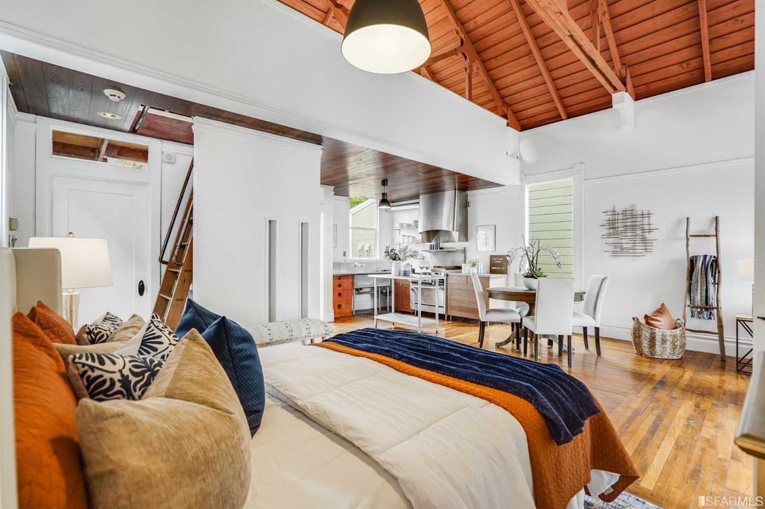 1366 34th Street Oakland, CA 94608 - Photo 15 of 51 a bed room with a bed and balcony