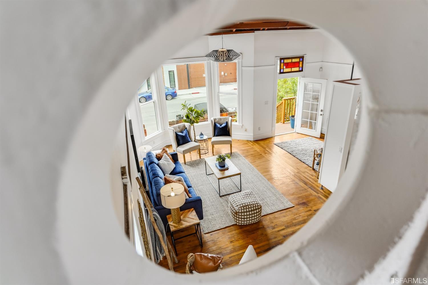 1366 34th Street Oakland, CA 94608 - Photo 18 of 51 a view of living room with furniture and a fireplace