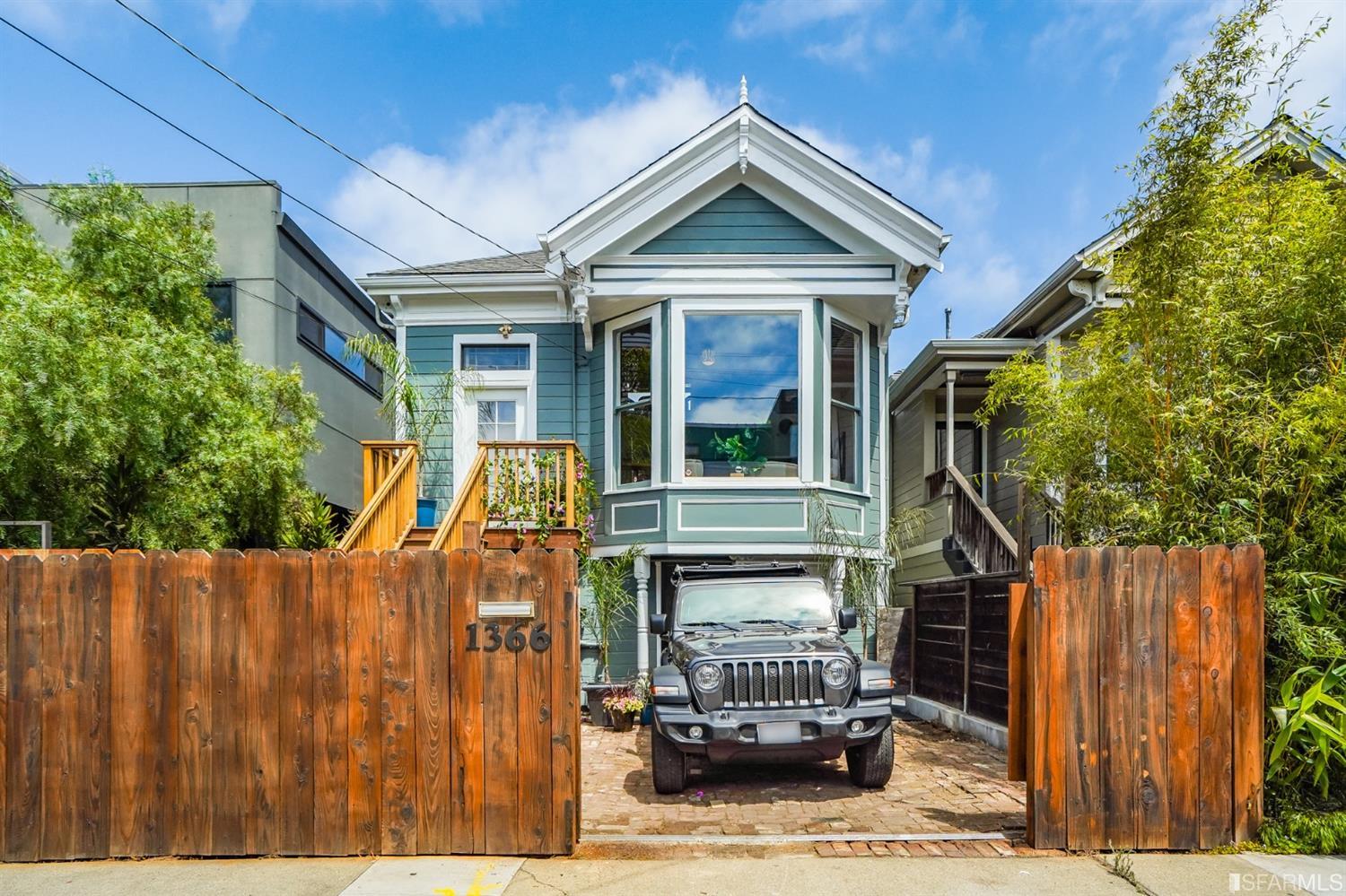 1366 34th Street Oakland, CA 94608 - Photo 38 of 51 a front view of a house with outdoor seating