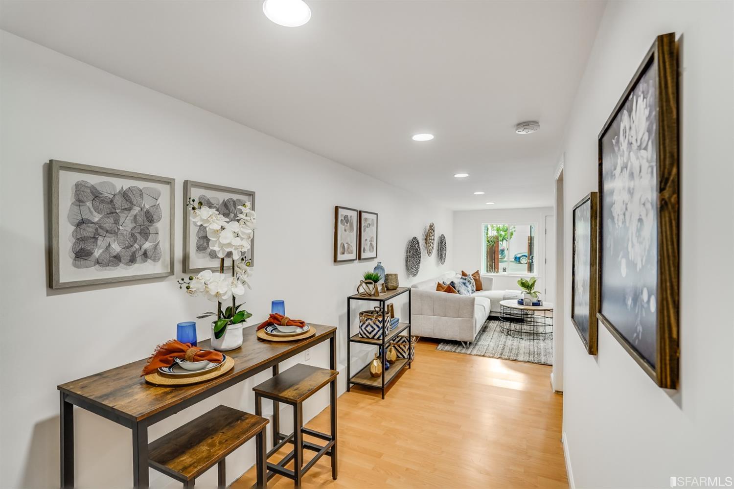 1366 34th Street Oakland, CA 94608 - Photo 45 of 51 a living room with furniture and a window