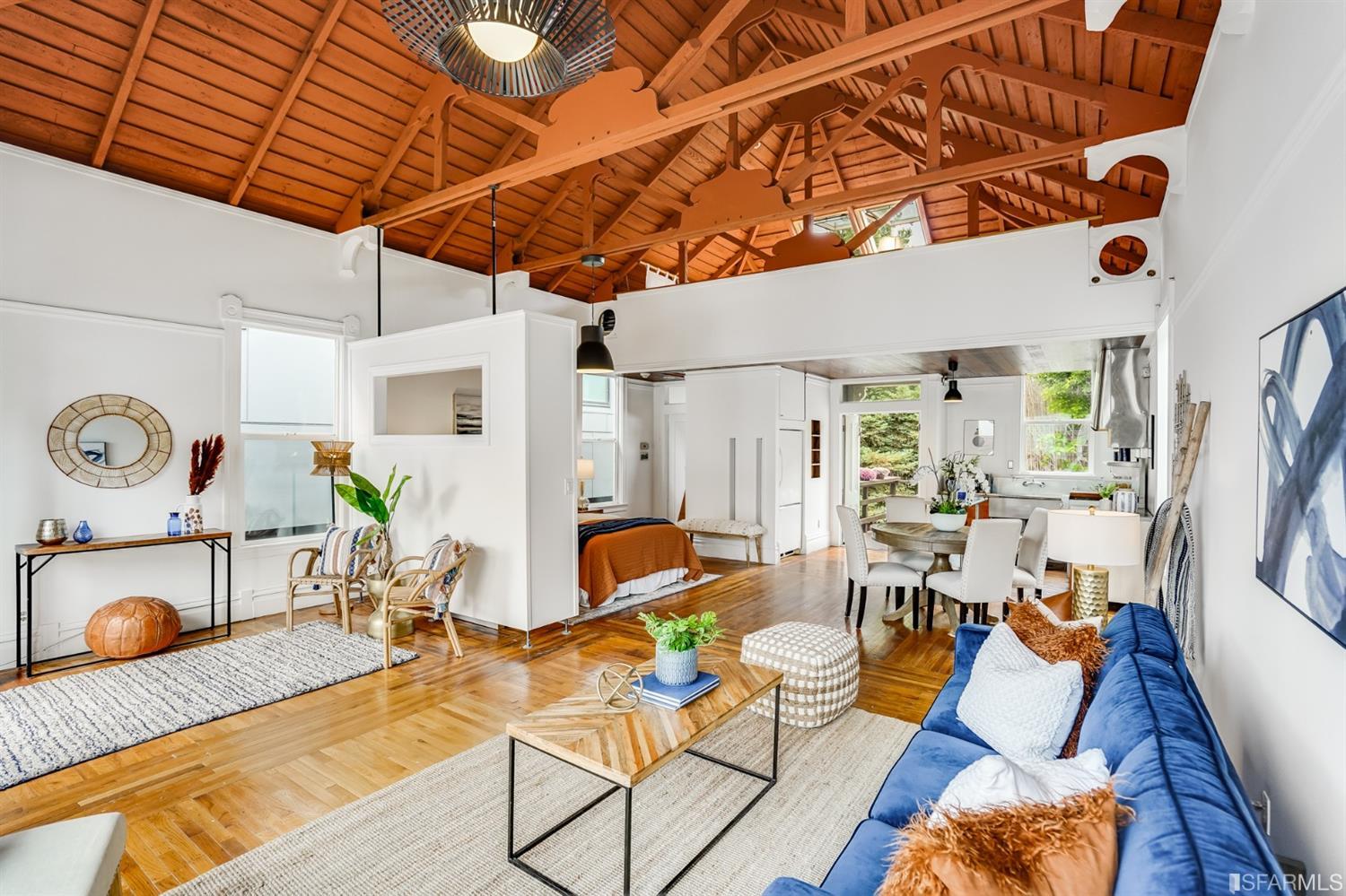 1366 34th Street Oakland, CA 94608 - Photo 8 of 51 a living room with furniture and wooden floor