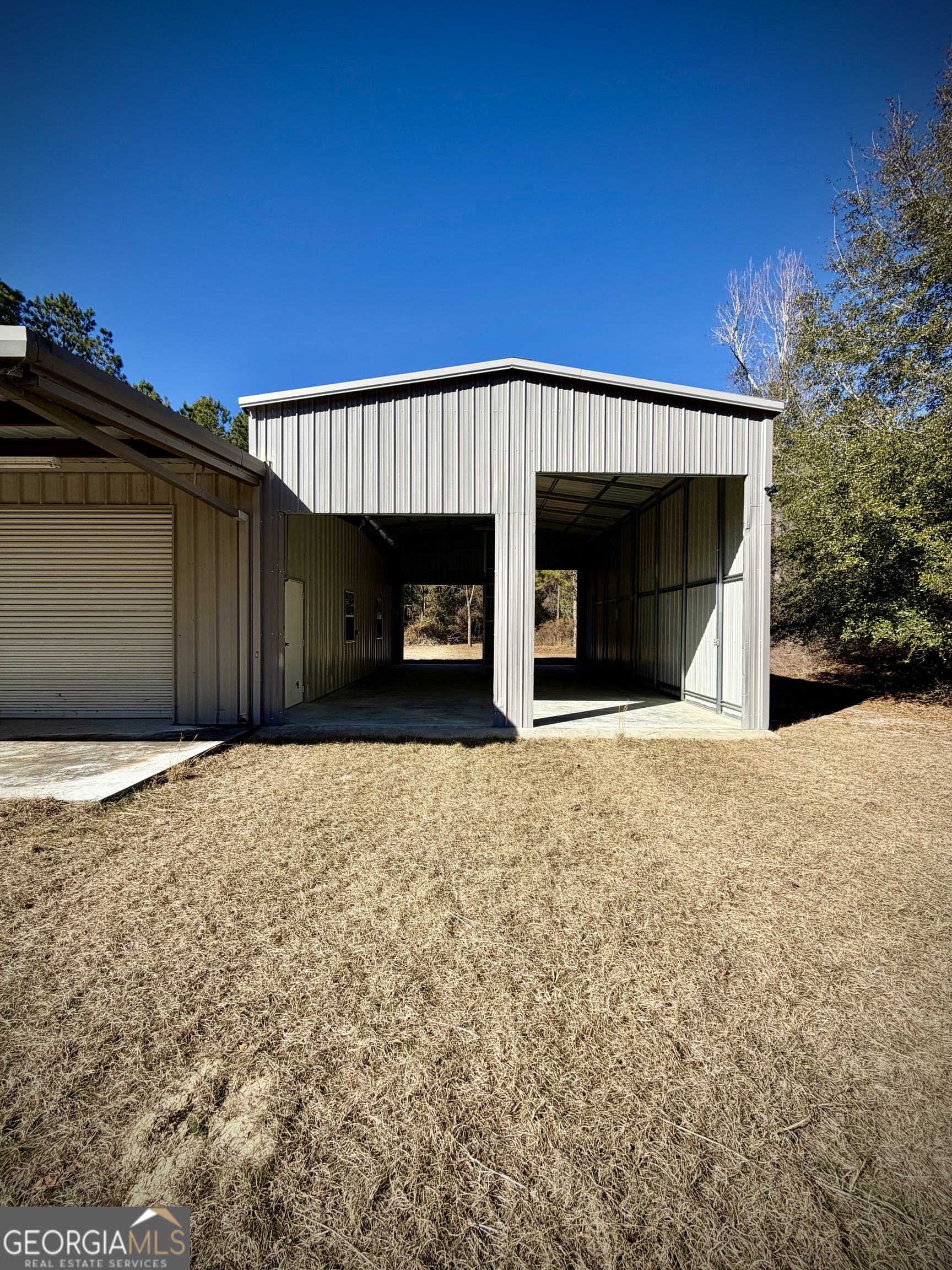 114 Ohoopee Road Adrian, GA 31002 - Photo 2 of 17 a front view of a house