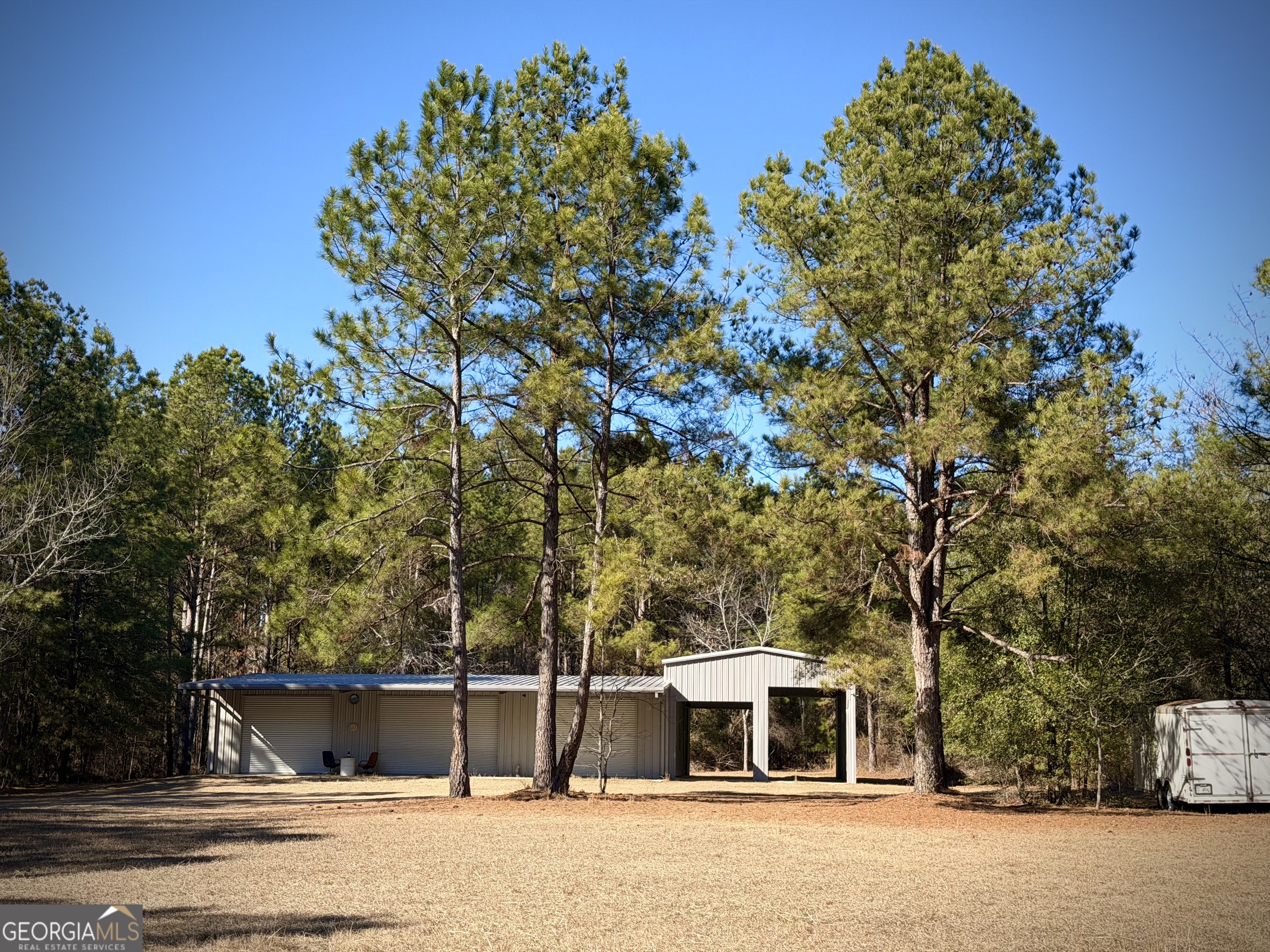 114 Ohoopee Road Adrian, GA 31002 - Photo 8 of 17 a view of a house with a large tree