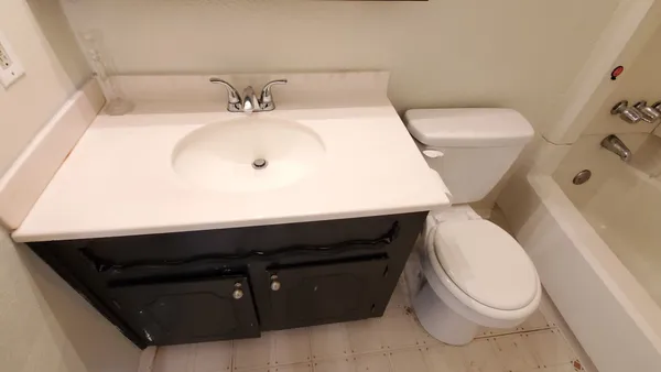 a bathroom with a sink and a toilet