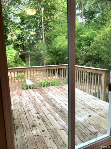 a view of a hallway with a white walls