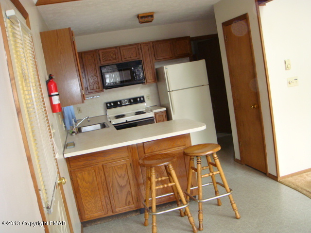 6502 Decker Road Bushkill, PA 18324 - Photo 3 of 21 a room with storage and utility