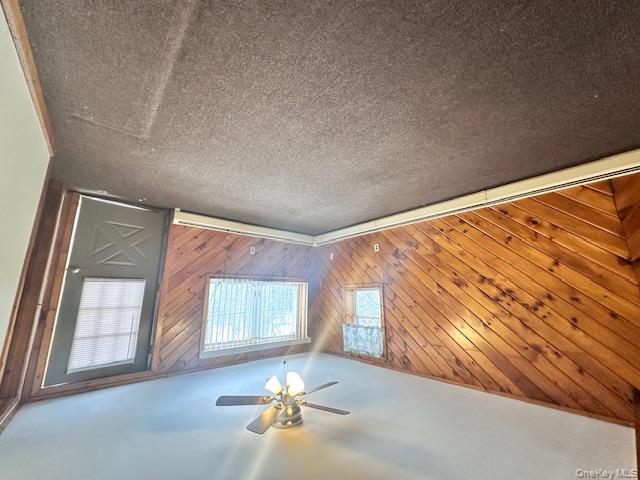 64 Yankee Lake Road Wurtsboro, NY 12790 - Photo 4 of 5 an empty room with windows