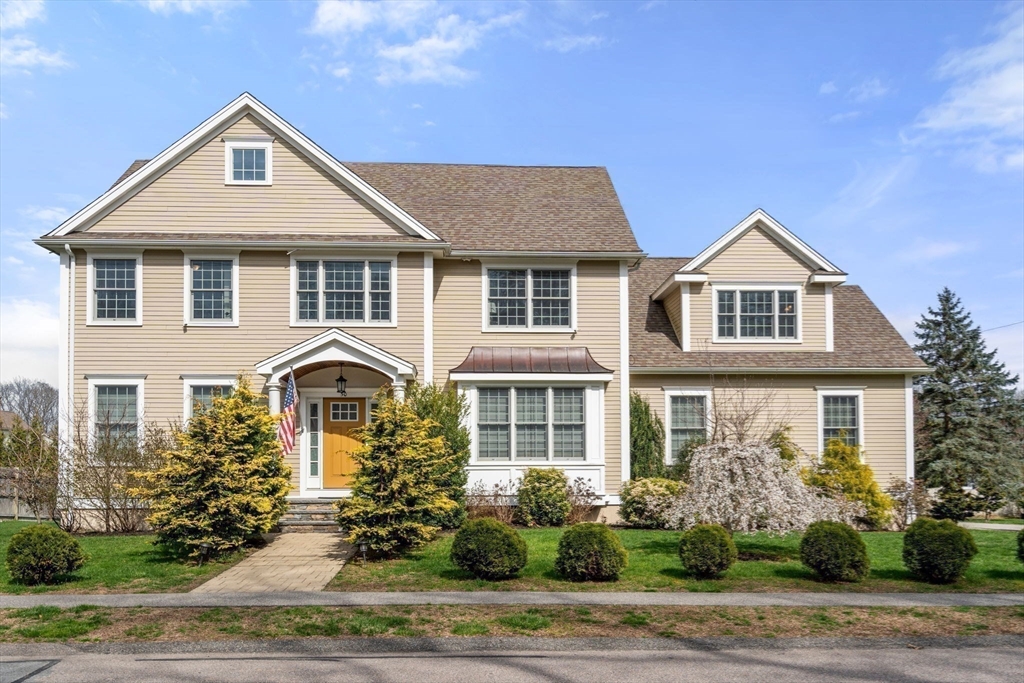 50 Sterling Road Needham, MA 02492 - Photo 1 of 29 a front view of a house with a yard