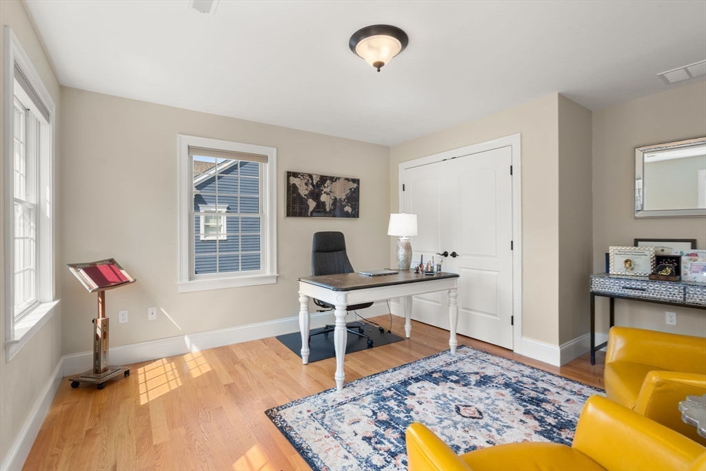 50 Sterling Road Needham, MA 02492 - Photo 15 of 29 a living room with furniture rug and window