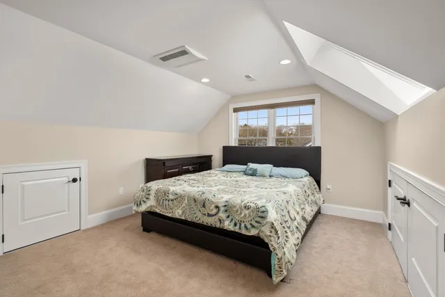 an aerial view of residential house with outdoor space and swimming pool