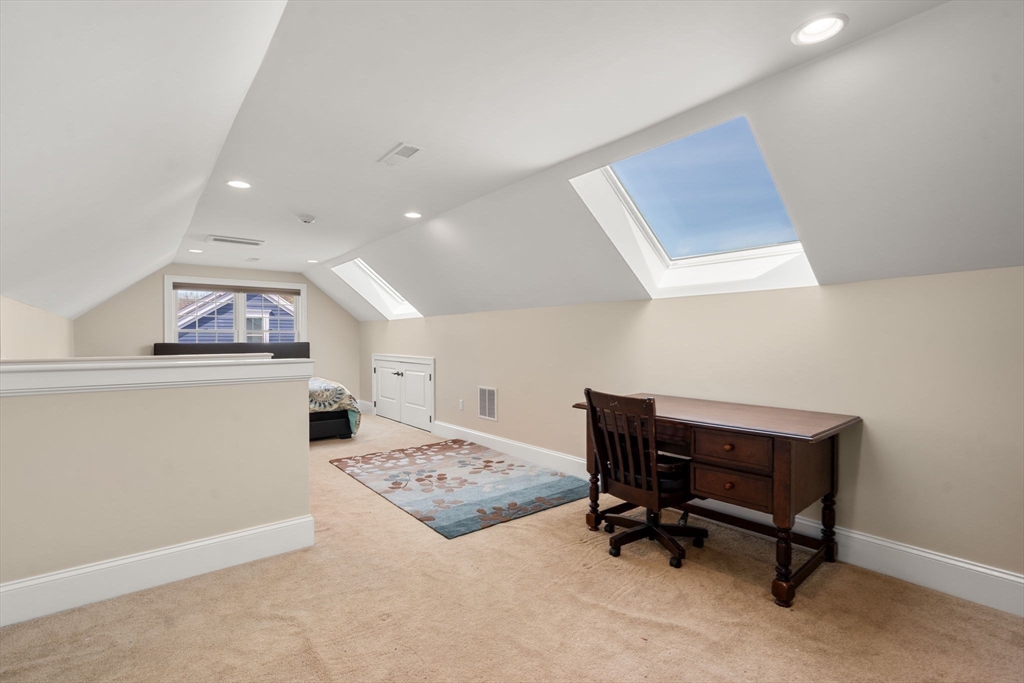 50 Sterling Road Needham, MA 02492 - Photo 20 of 29 a room with a desk and a chair