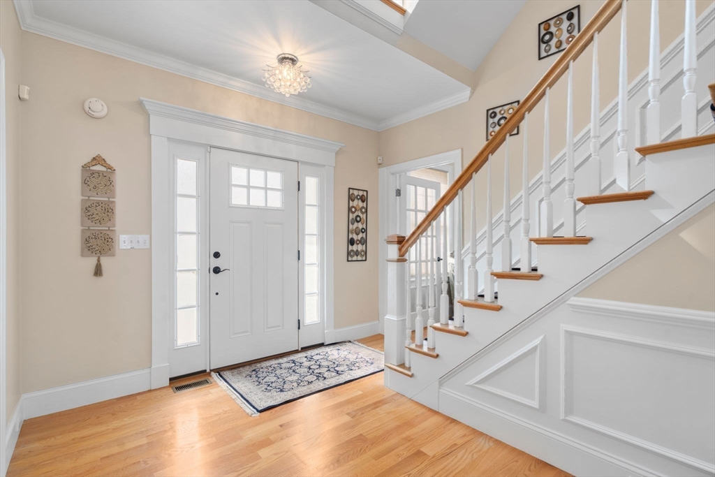 50 Sterling Road Needham, MA 02492 - Photo 3 of 29 a view of entryway and hall with wooden floor
