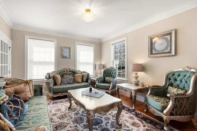 a bathroom with a granite countertop toilet a sink and a mirror