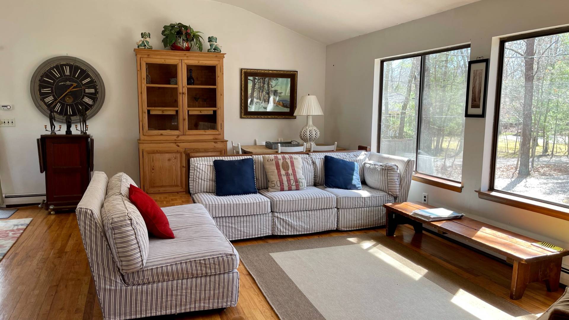 11 Bathgate Road Wainscott, NY 11975 - Photo 2 of 13 a living room with furniture and a large window