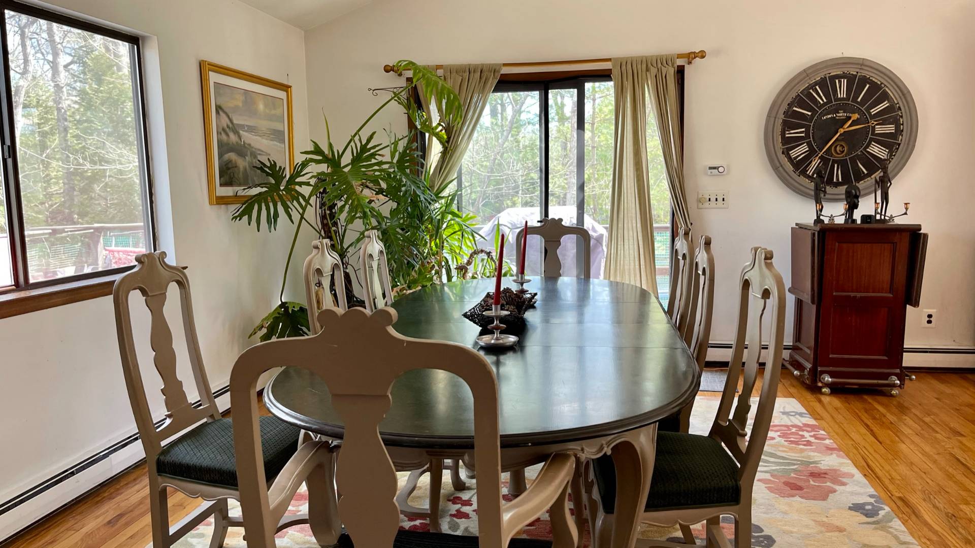 11 Bathgate Road Wainscott, NY 11975 - Photo 4 of 13 a view of a dining room with furniture window and wooden floor