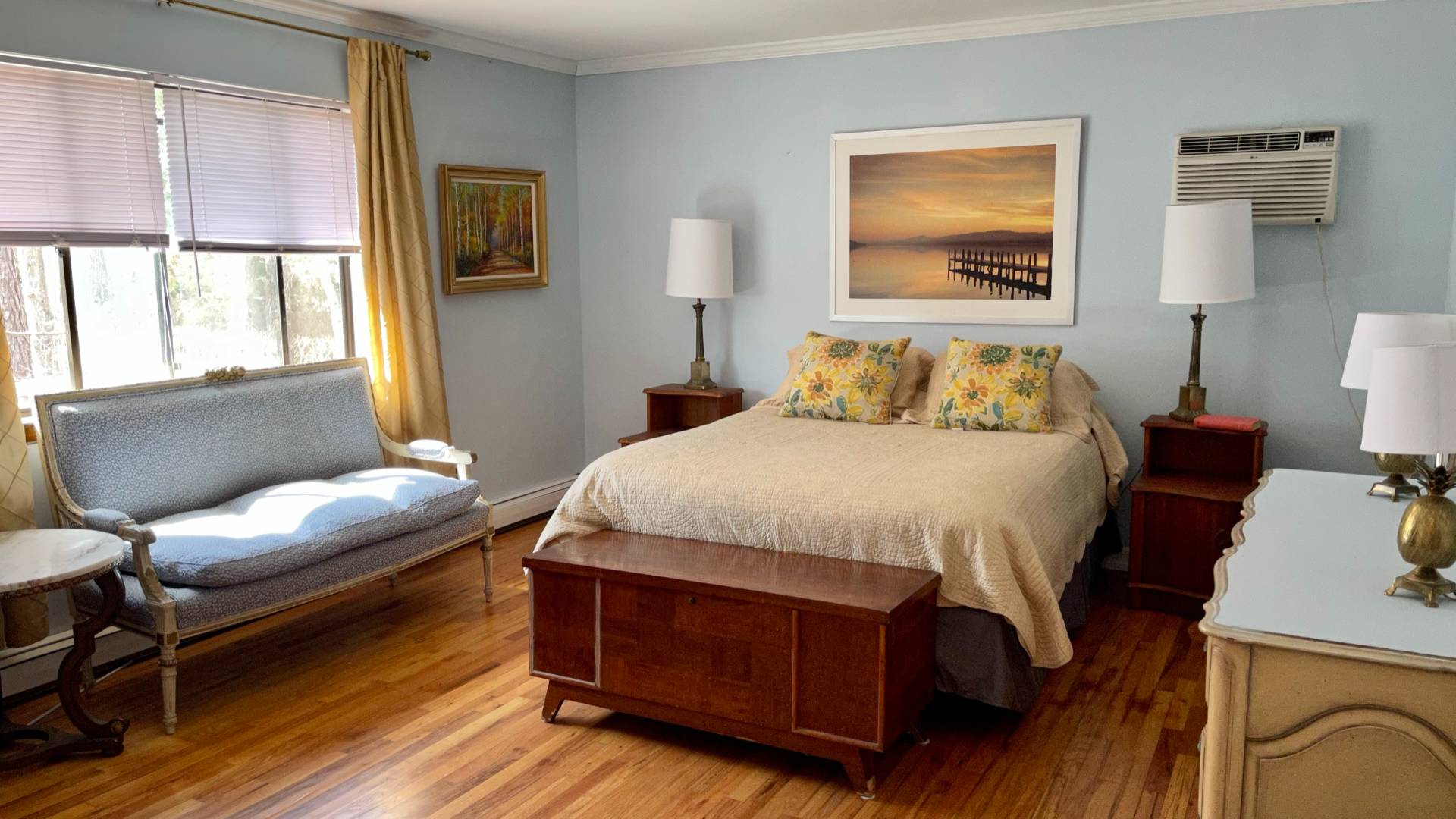 11 Bathgate Road Wainscott, NY 11975 - Photo 5 of 13 a bedroom with a bed and wooden floor