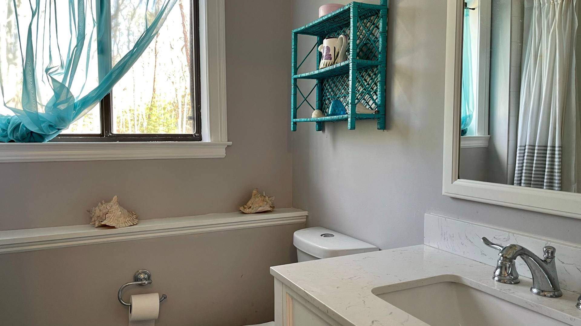 11 Bathgate Road Wainscott, NY 11975 - Photo 10 of 13 a bathroom with a sink and a toilet