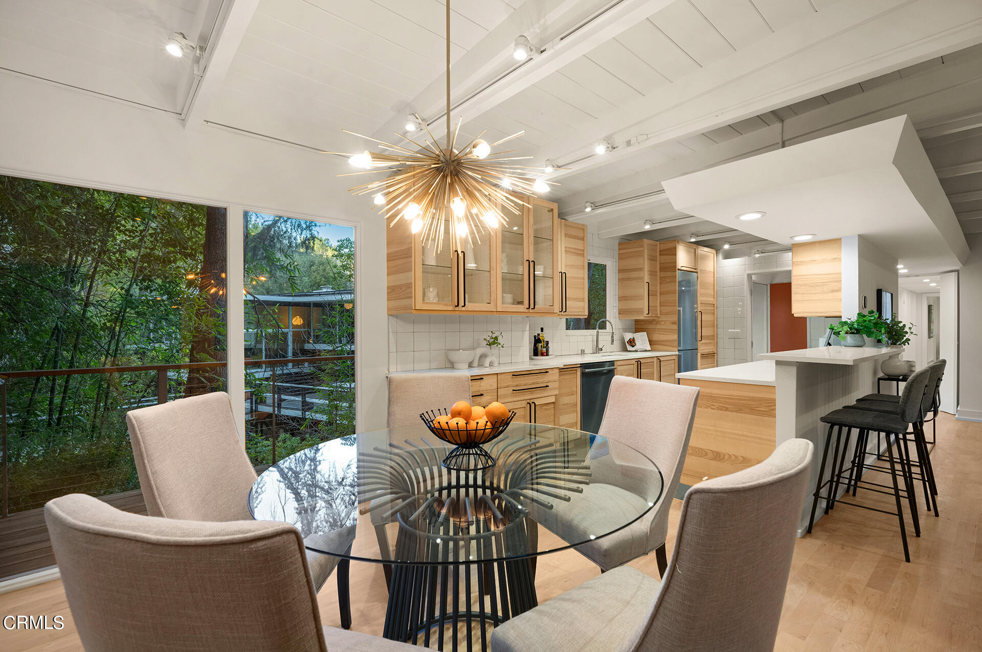 911 Laguna Road Pasadena, CA 91105 - Photo 11 of 34 a living room with furniture and a large window