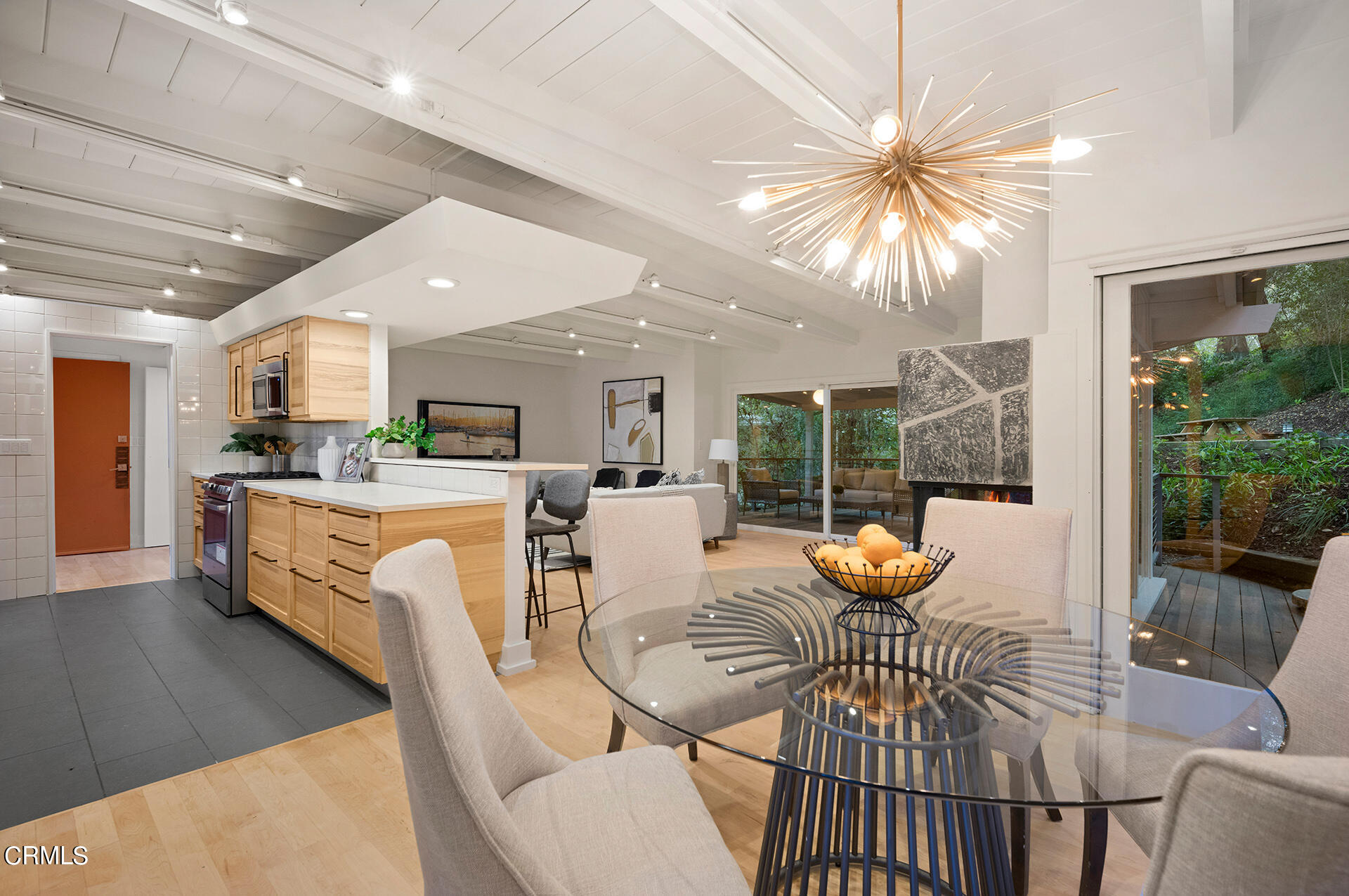 911 Laguna Road Pasadena, CA 91105 - Photo 12 of 34 a living room with furniture and a large window
