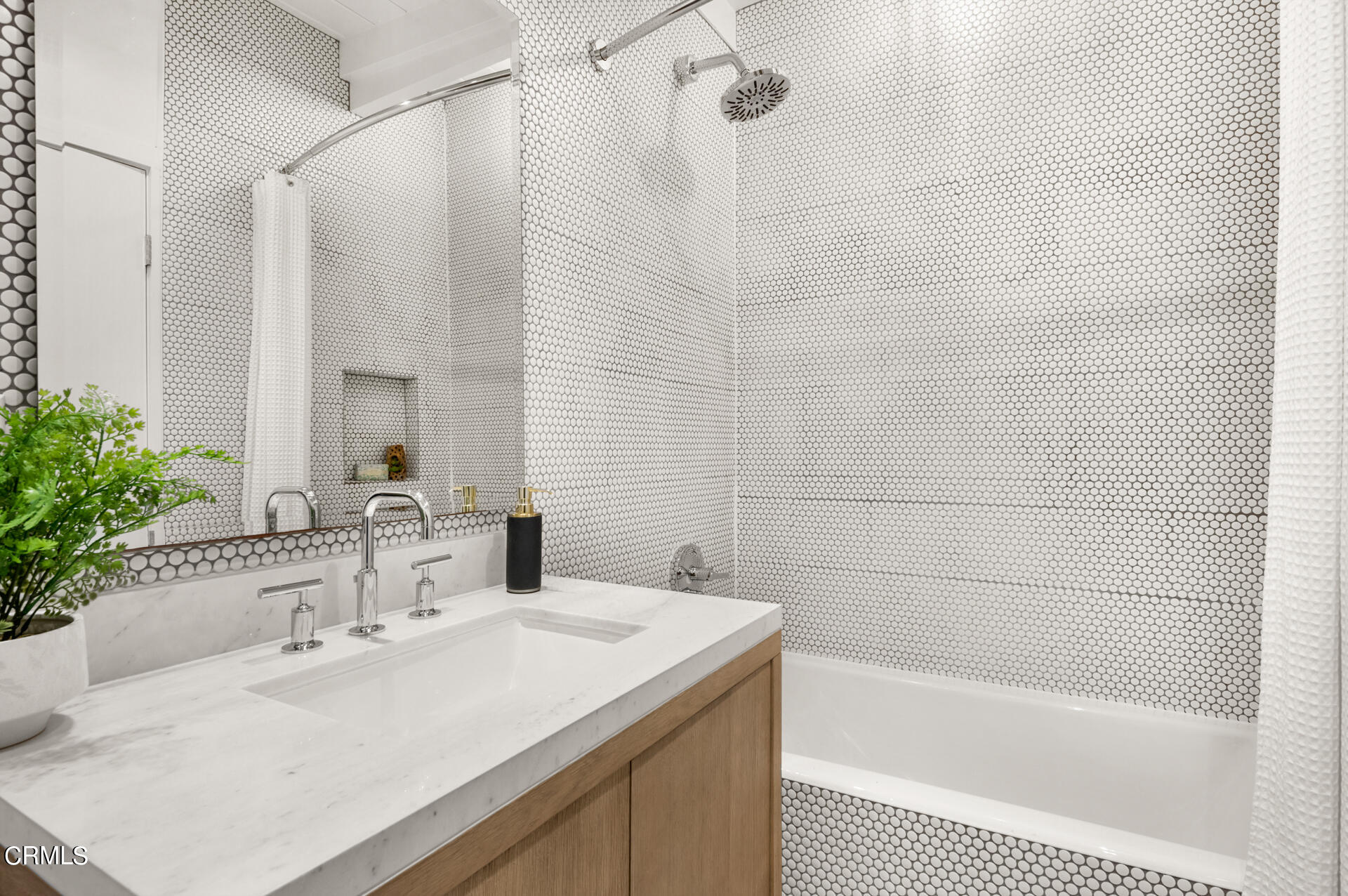 911 Laguna Road Pasadena, CA 91105 - Photo 18 of 34 a bathroom with a sink and a bathtub