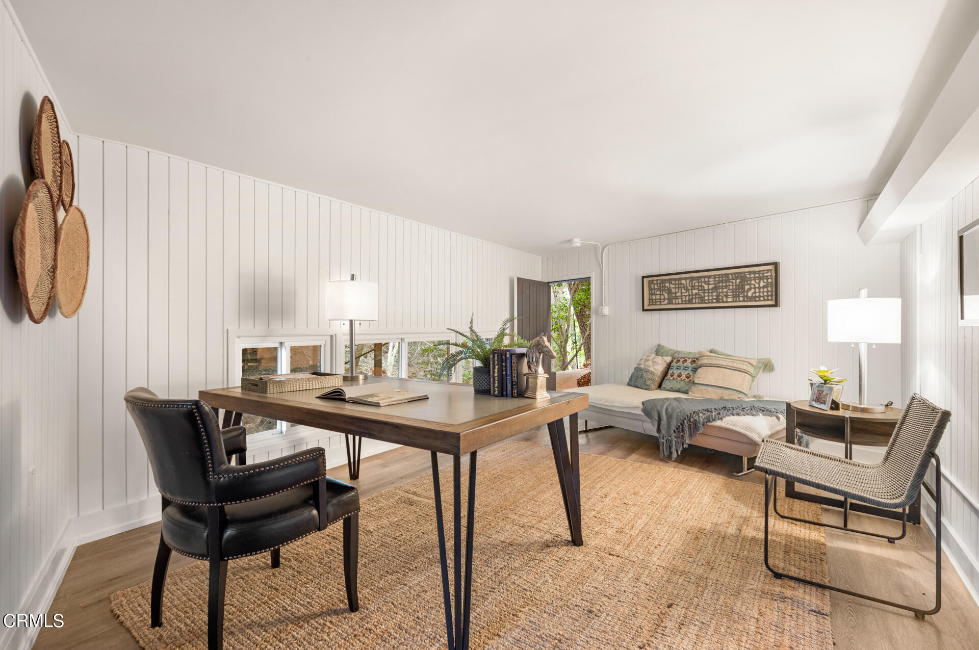911 Laguna Road Pasadena, CA 91105 - Photo 23 of 34 a living room with furniture and a large window