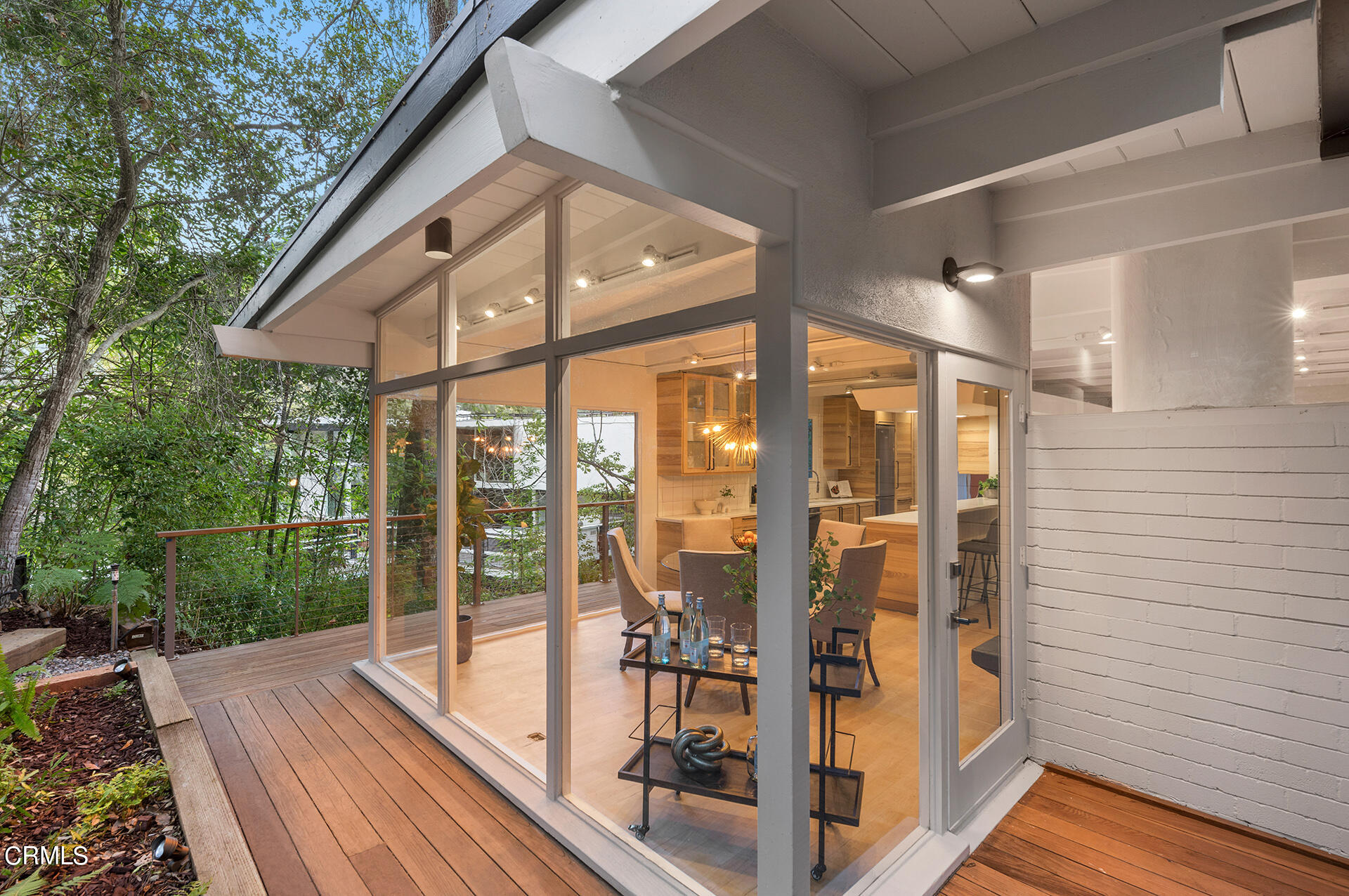 911 Laguna Road Pasadena, CA 91105 - Photo 27 of 34 a view of balcony with floor to ceiling window and wooden floor