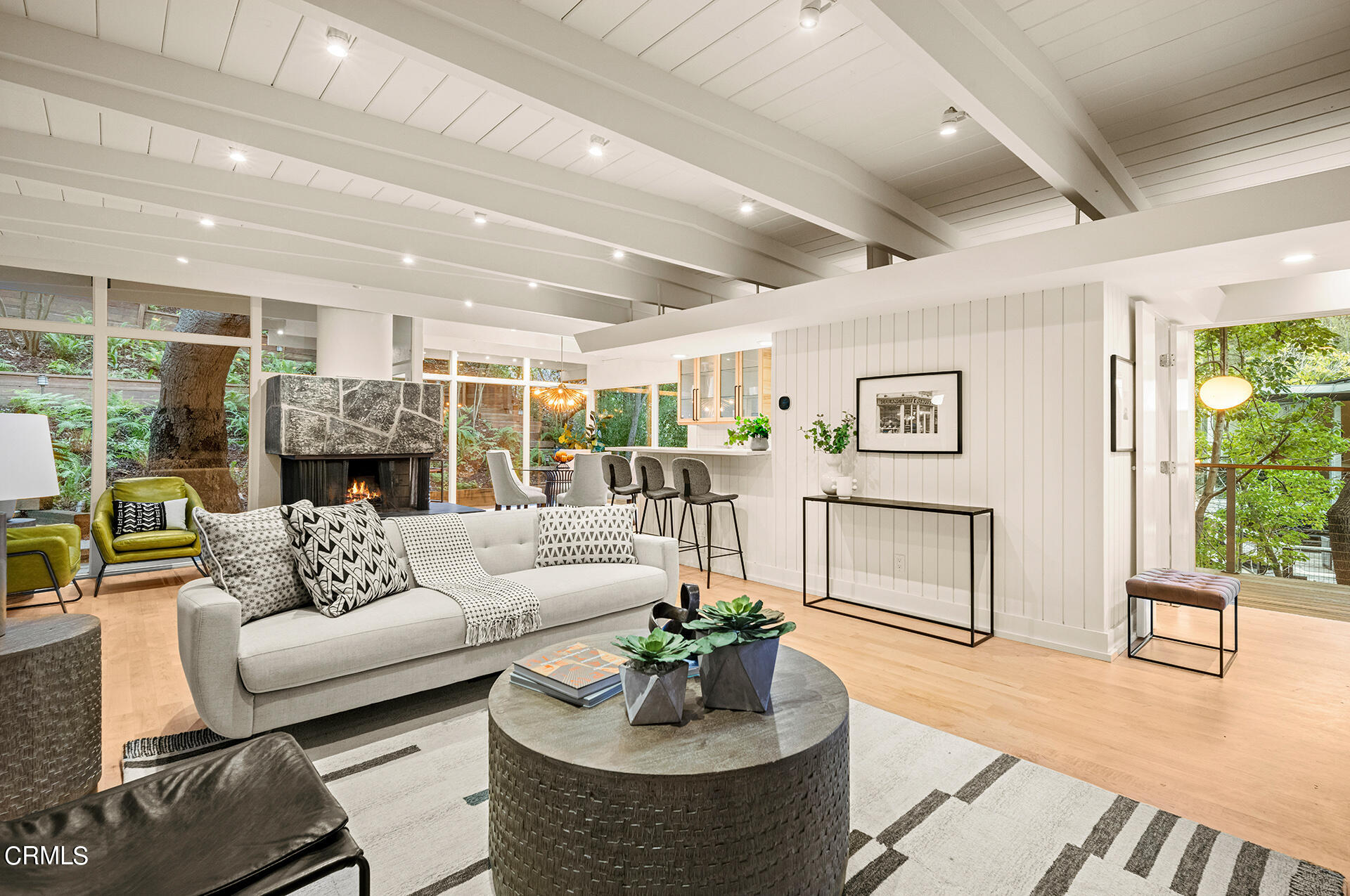 911 Laguna Road Pasadena, CA 91105 - Photo 4 of 34 a living room with furniture and a fireplace