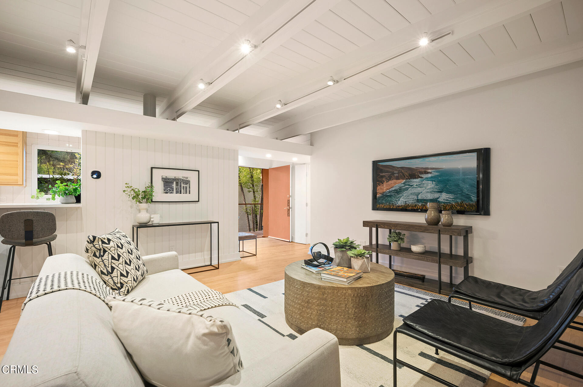 911 Laguna Road Pasadena, CA 91105 - Photo 5 of 34 a living room with furniture and a flat screen tv