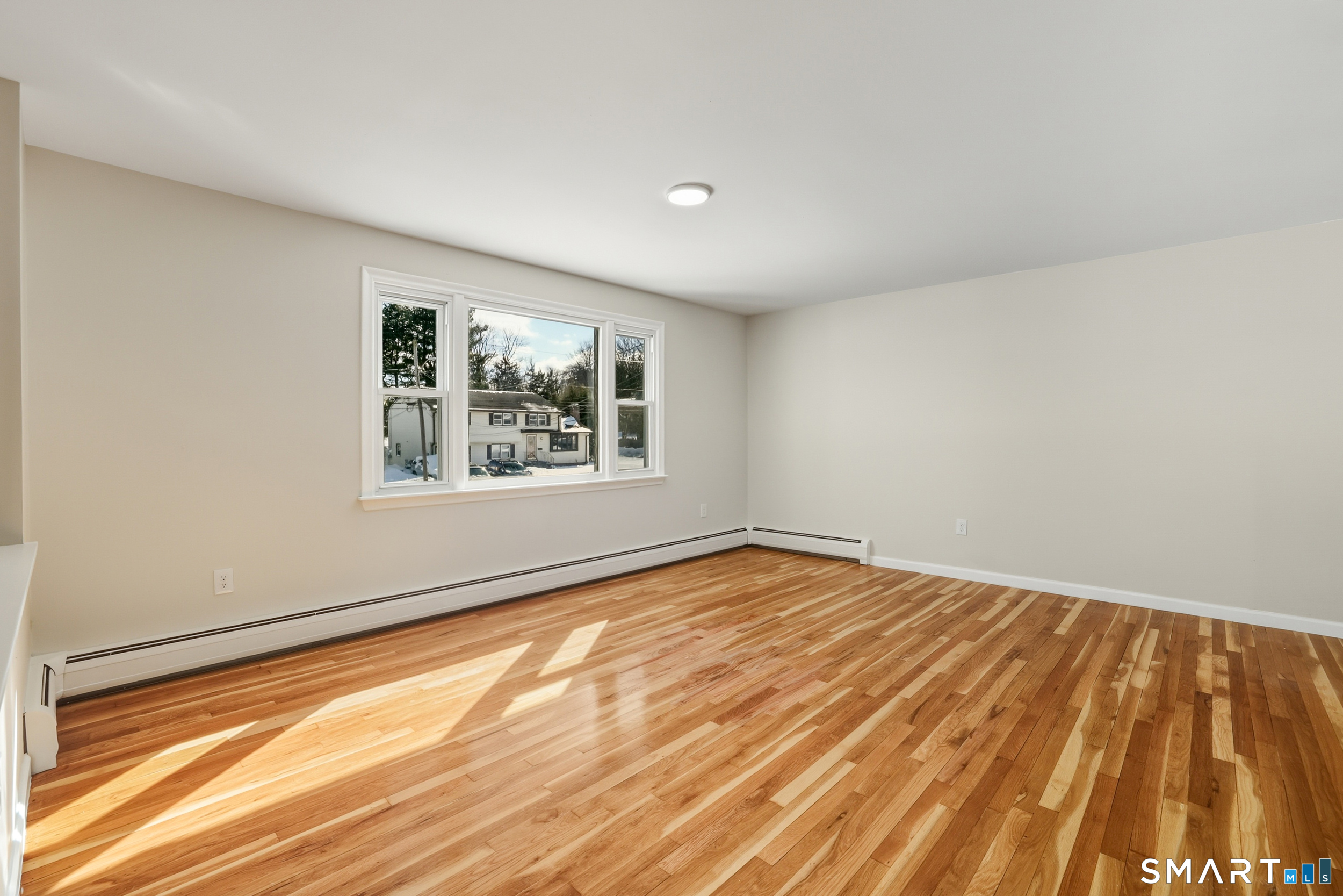 38 Mildred Road West Hartford, CT 06107 - Photo 12 of 35 a view of an empty room and window