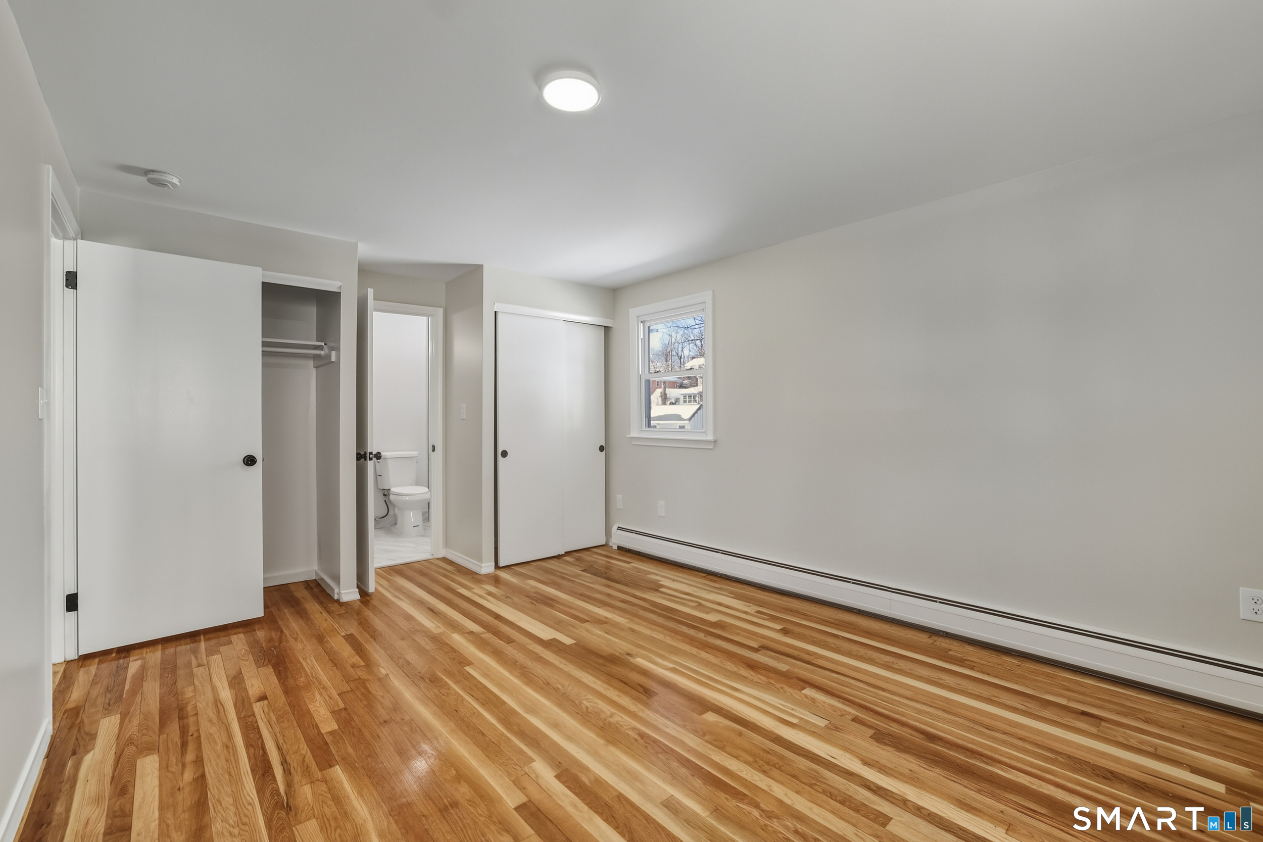 38 Mildred Road West Hartford, CT 06107 - Photo 16 of 35 a view of a room with wooden floor and bathroom
