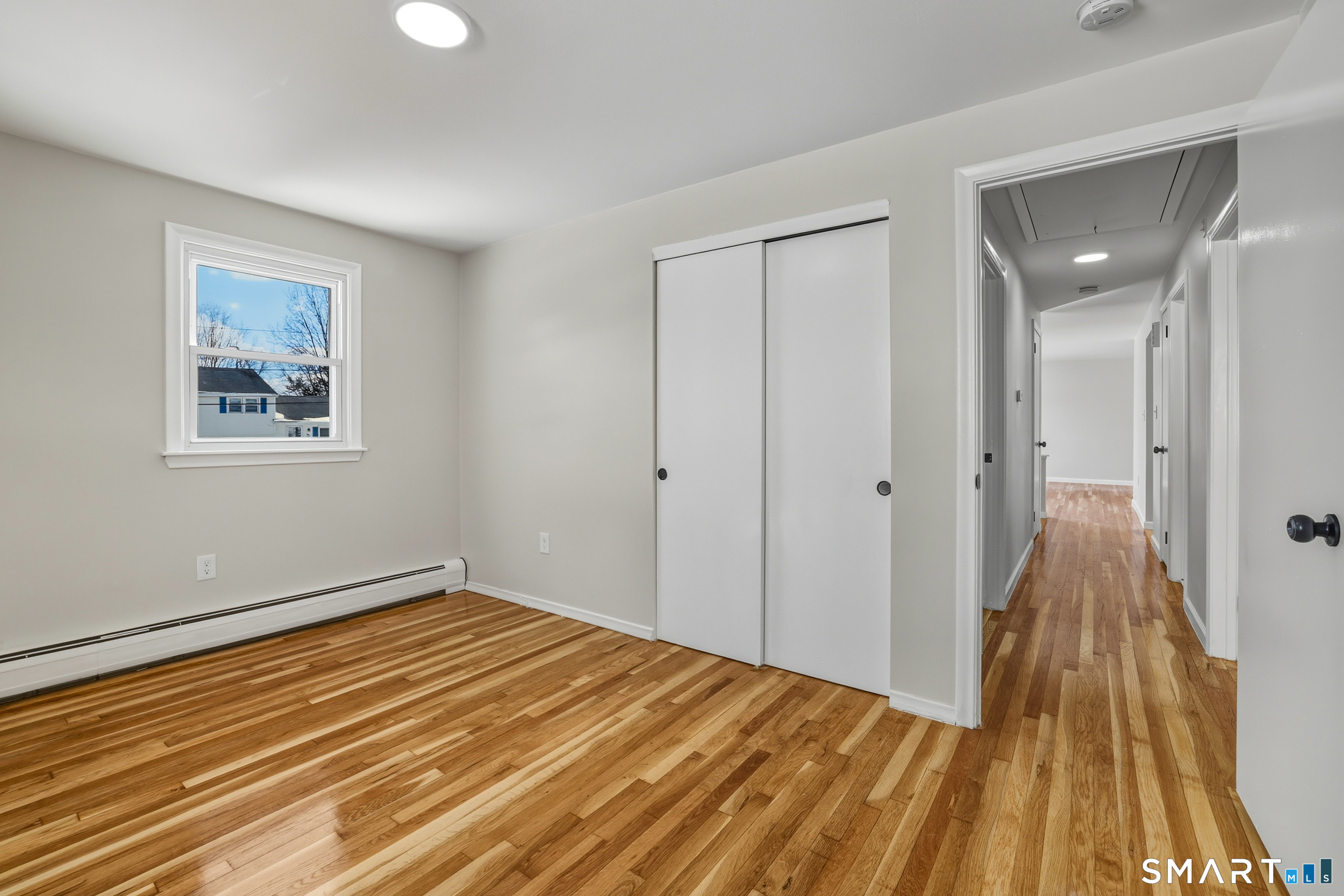 38 Mildred Road West Hartford, CT 06107 - Photo 18 of 35 a view of a room with wooden floor and bathroom
