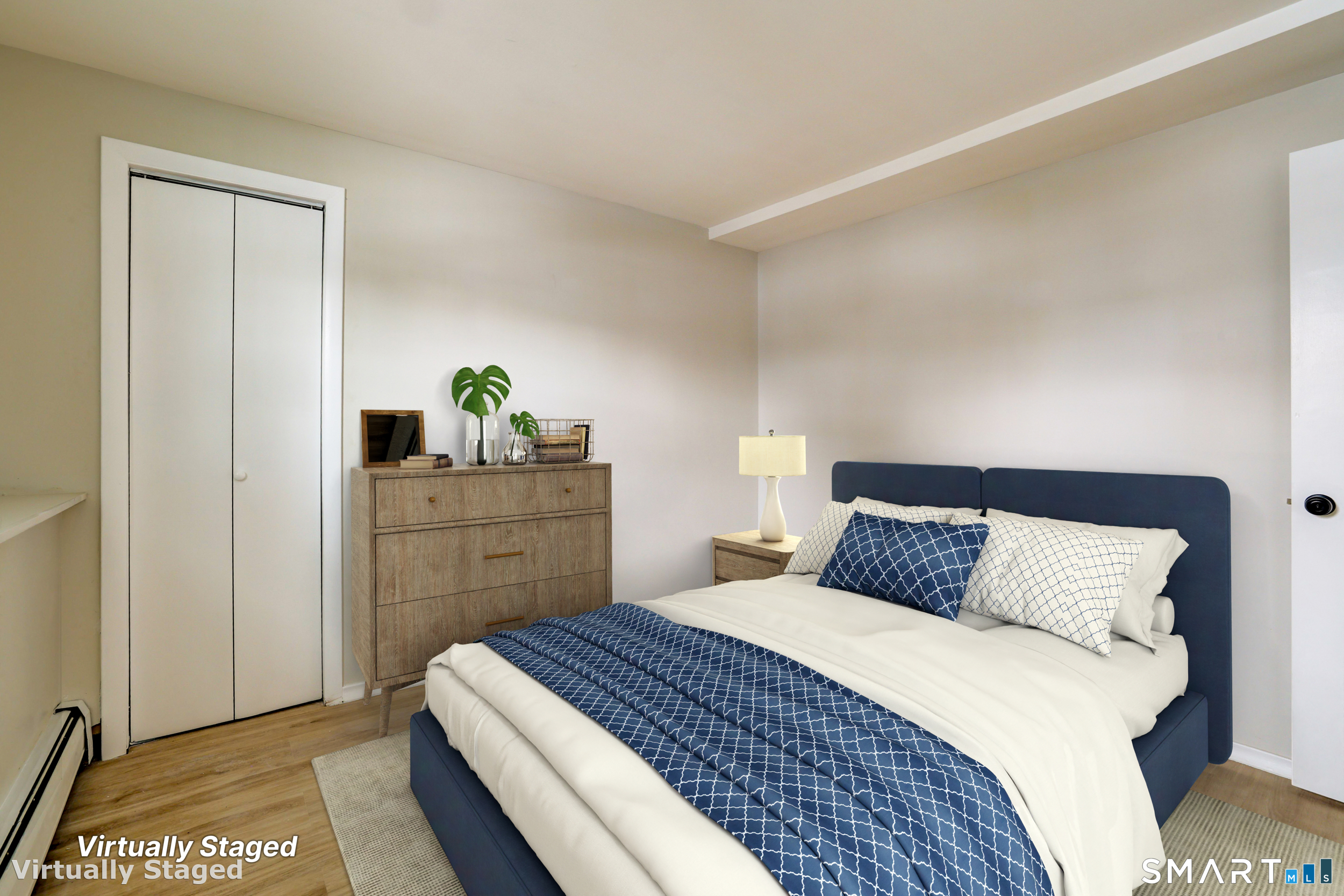 38 Mildred Road West Hartford, CT 06107 - Photo 22 of 35 a bedroom with a bed and a dresser