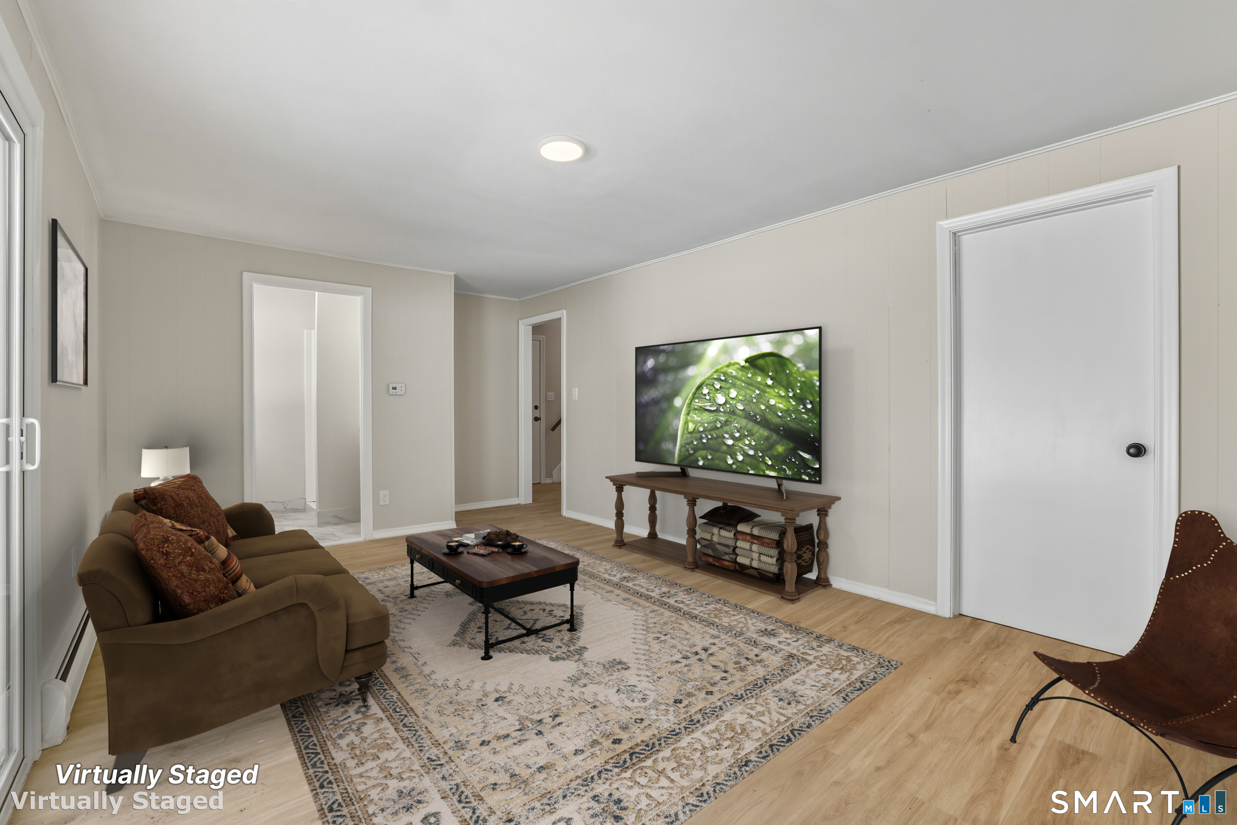 38 Mildred Road West Hartford, CT 06107 - Photo 23 of 35 a living room with furniture and a flat screen tv